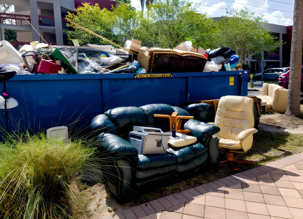 Dumpster full of garbages at residential garbage dump area